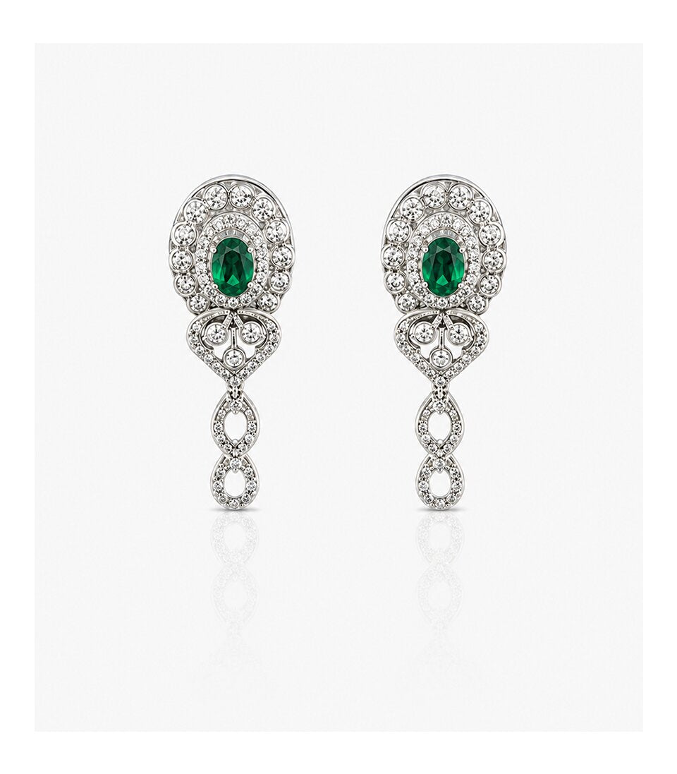 Luxurious Diamond Earrings Highlighting Vibrant Green Gemstones