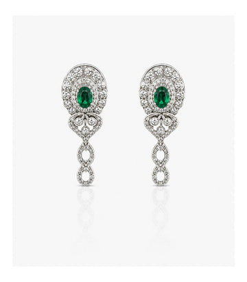 Luxurious Diamond Earrings Highlighting Vibrant Green Gemstones