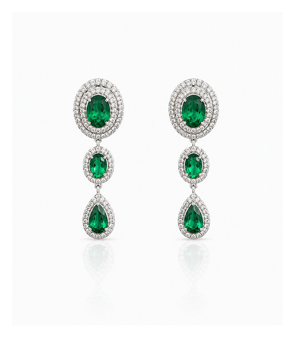 Graceful Diamond Earrings Featuring Emerald Green Teardrop Design