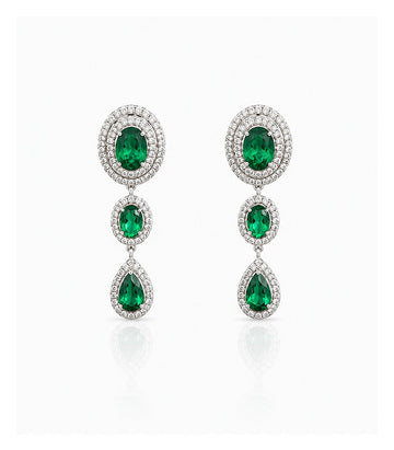 Graceful Diamond Earrings Featuring Emerald Green Teardrop Design