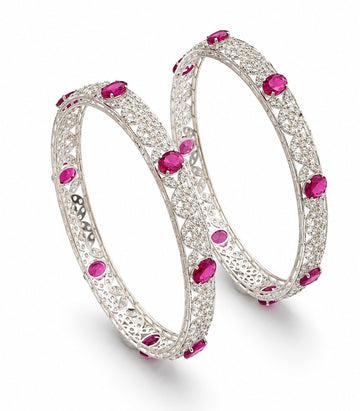 Diamond Bangles With Pink Gemstones And Floral Pattern