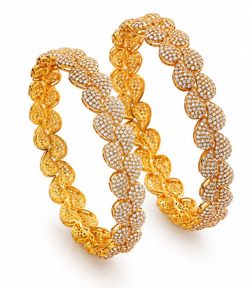 Pair Of Gold Bangles With Intricate Design