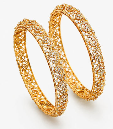 Pair Of Gold Bangles With Small White Stones