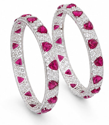 Diamond Bangles Featuring a Continuous Row Of Trillion-Cut Rubies
