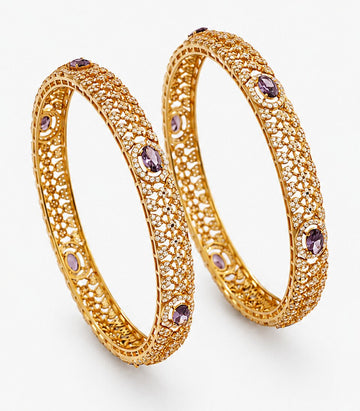Elegant Pair Of Gold Bangles With White Stones And Circular Stone Design