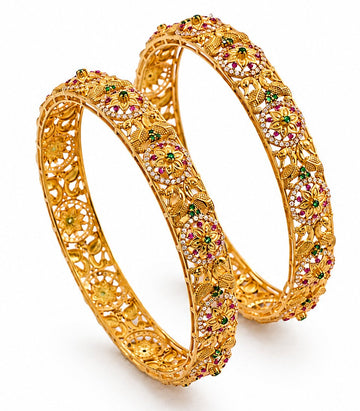 Pair Of Gold Bangles With Intricate Designs