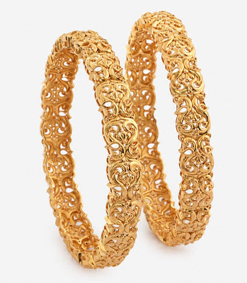 Two Luxurious Gold Bangles Crafted With Exquisite Intricate Designs
