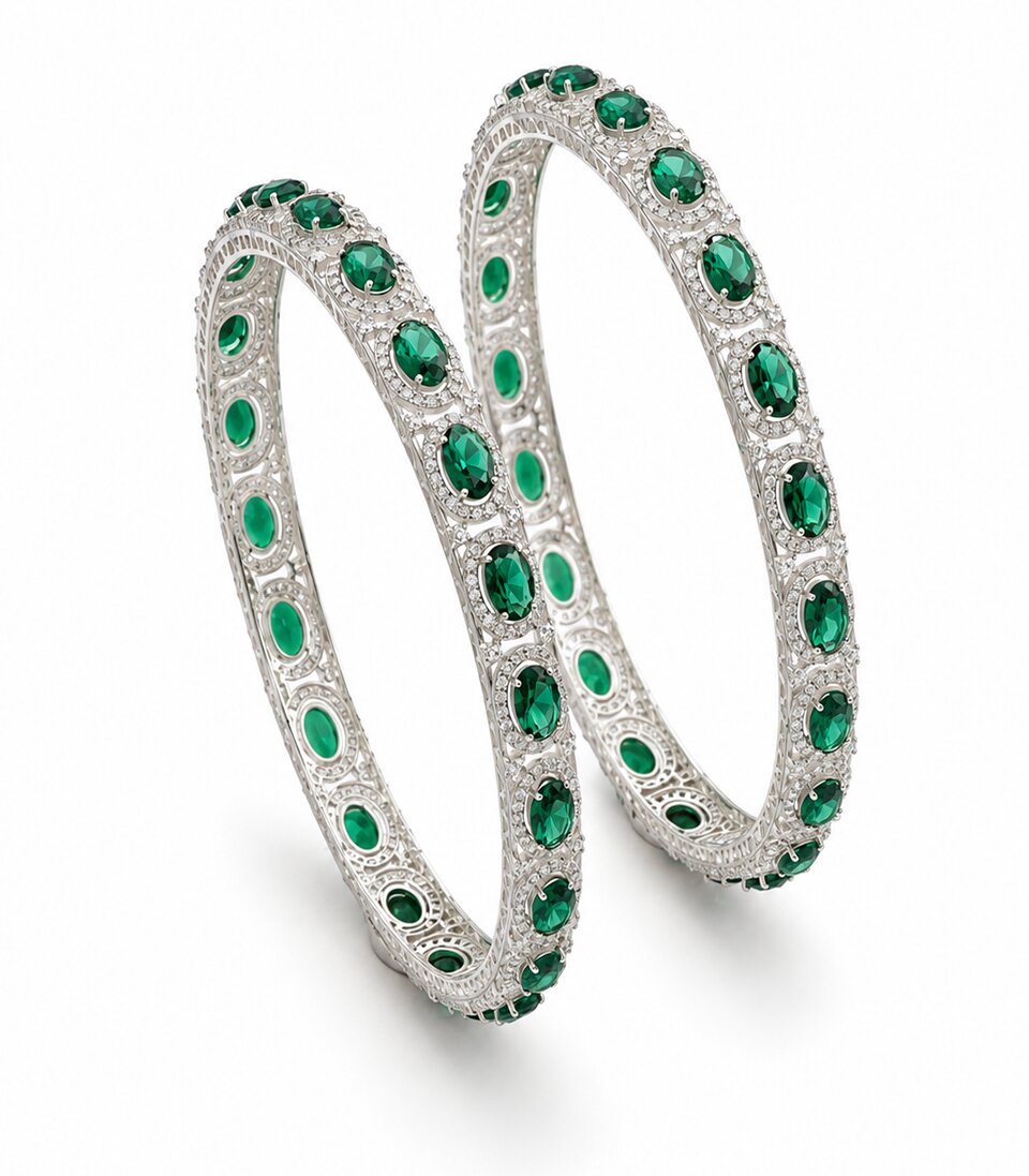 Pair Of Diamond Bangles With Oval Green