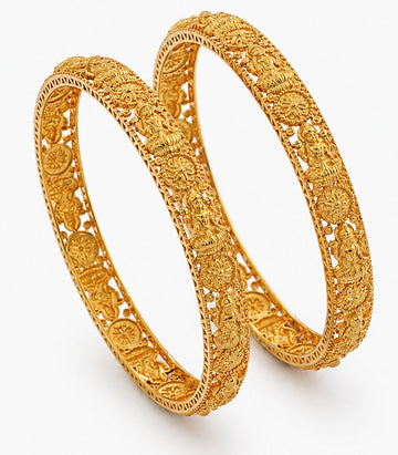 Two Elegant Gold Bangles Featuring Intricate Lakshmi And Floral Temple Designs