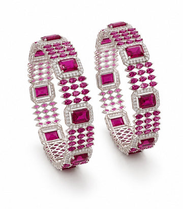 Pair Of Bangles With Pink Gemstones