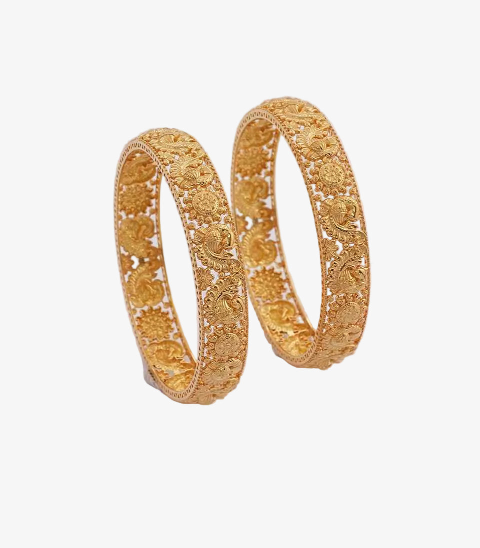 gold bangles featuring a continuous openwork design of intricately carved peacock and sunflower motifs in a traditional filigree style.