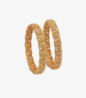 gold bangles showcasing a continuous, interconnected lace-like pattern of scrolling vine and heart-shaped filigree work.