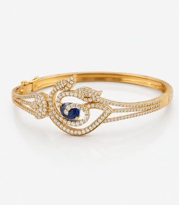 Sophisticated Yellow-Gold Bracelet Featuring A Striking Peacock