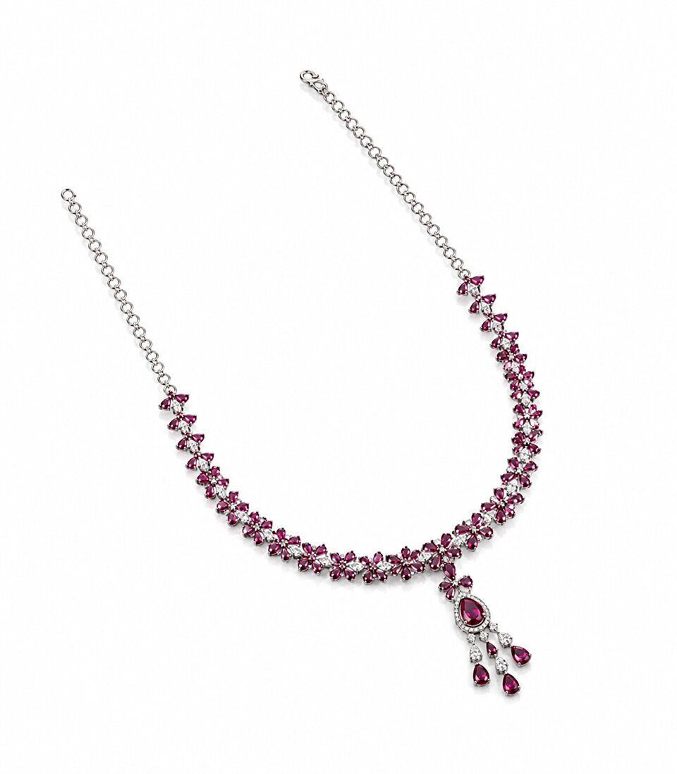 Necklace With Pink Gemstones And A Pendant