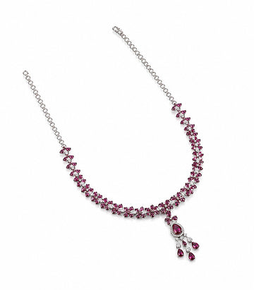 Necklace With Pink Gemstones And A Pendant