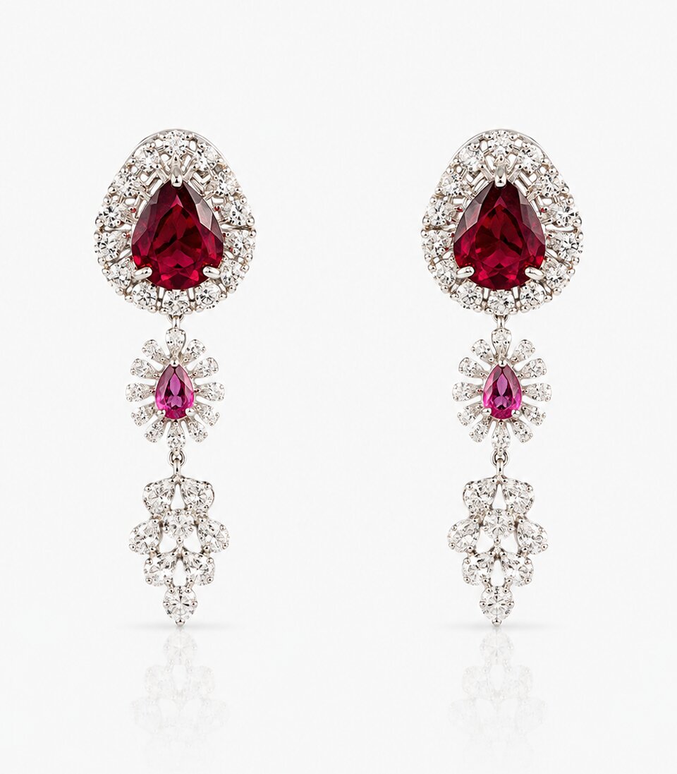 Striking Diamond Earrings Accented with Vibrant Red Gemstones