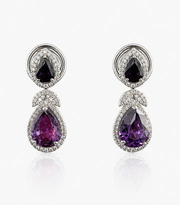 Pair Of Earrings With Purple Gemstones