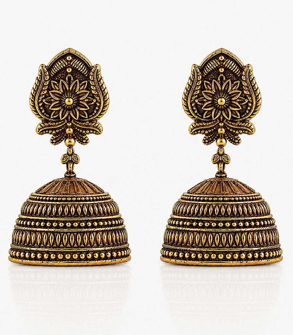 Pair Of Gold And Silver Jhumka Earrings With Leaf Design