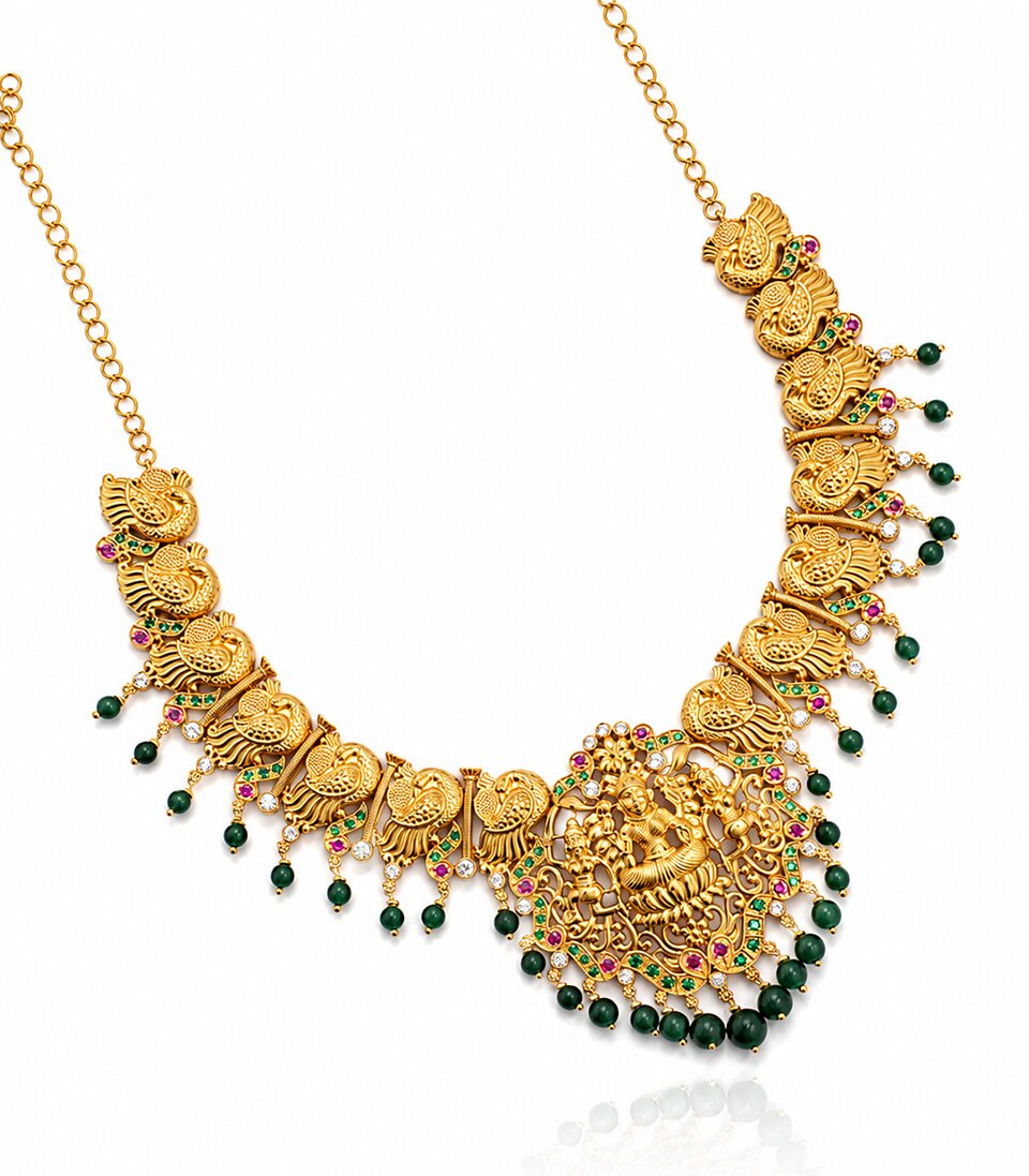 A Yellow Gold Necklace Featuring A Three-Row Chain