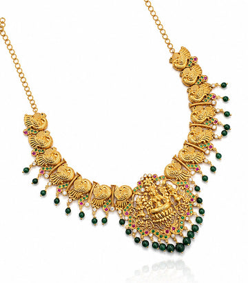 A Yellow Gold Necklace Featuring A Three-Row Chain
