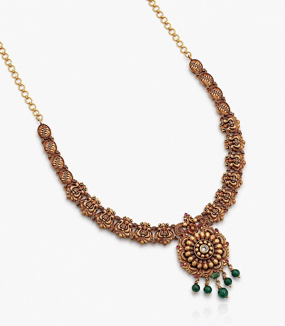 An Antique-Finish Gold Necklace With A Chain