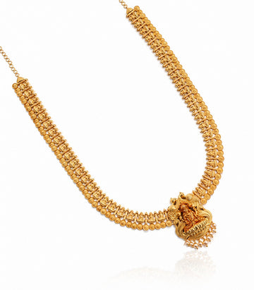 A Long Gold Temple Haram Featuring A Central Goddess Lakshmi Pendant Finished