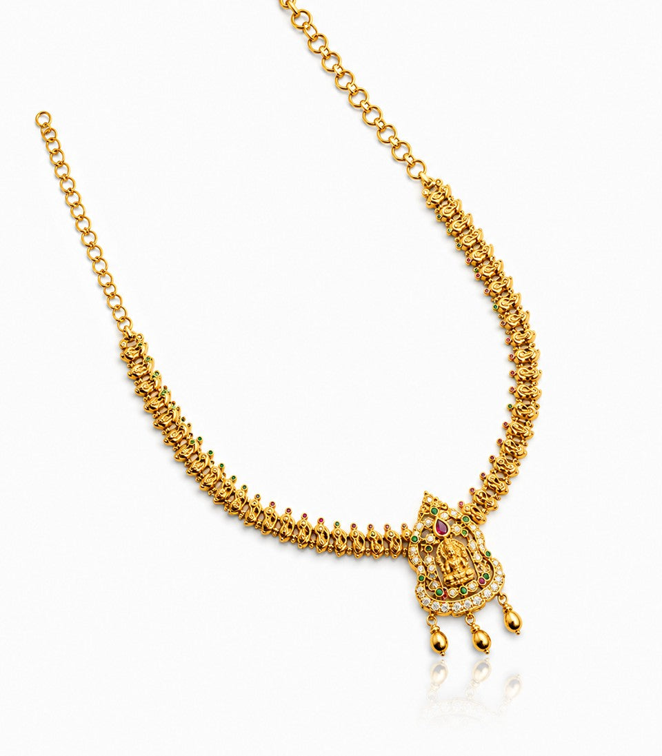 An Elegant Gold Necklace In A Traditional South Indian Temple Jewelry Style.