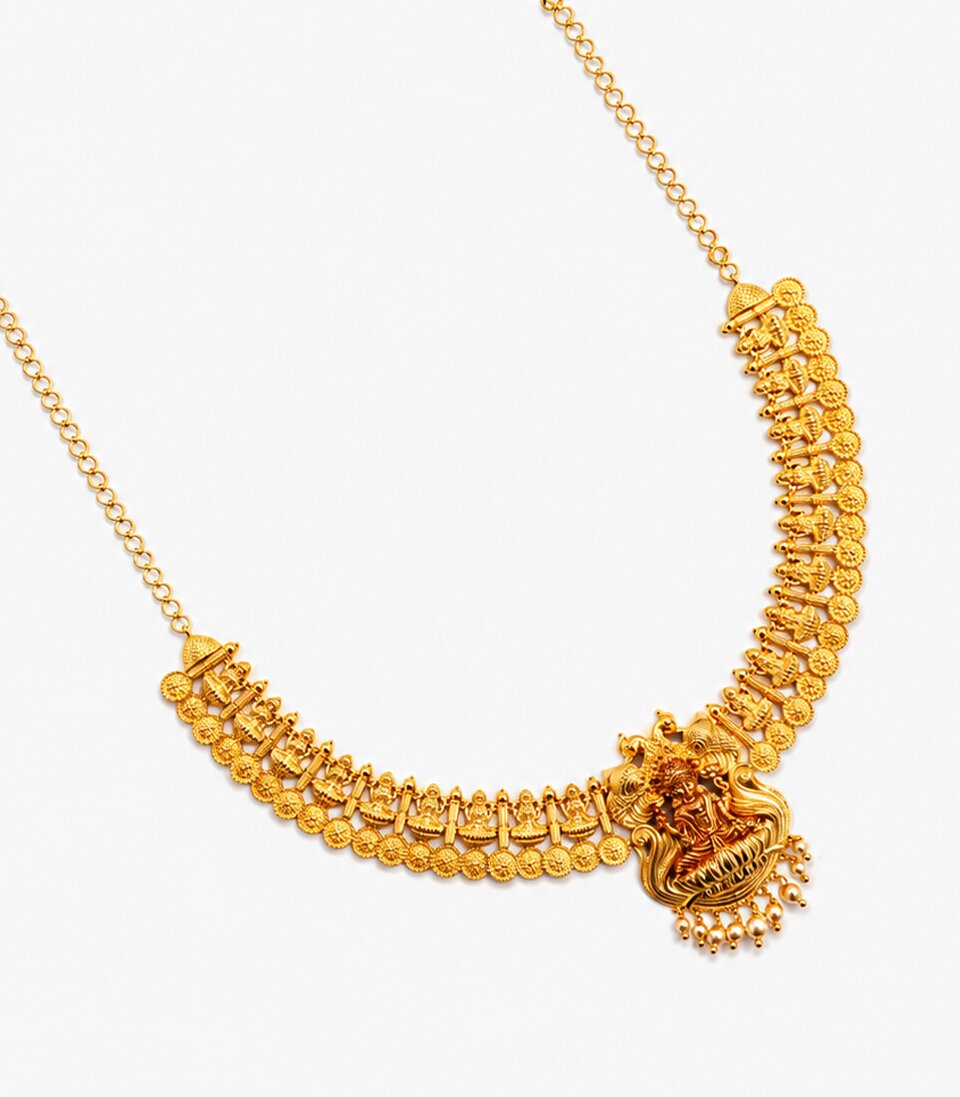 A Yellow Gold Kasu Mala Necklace Featuring A Central Goddess Lakshmi Pendant