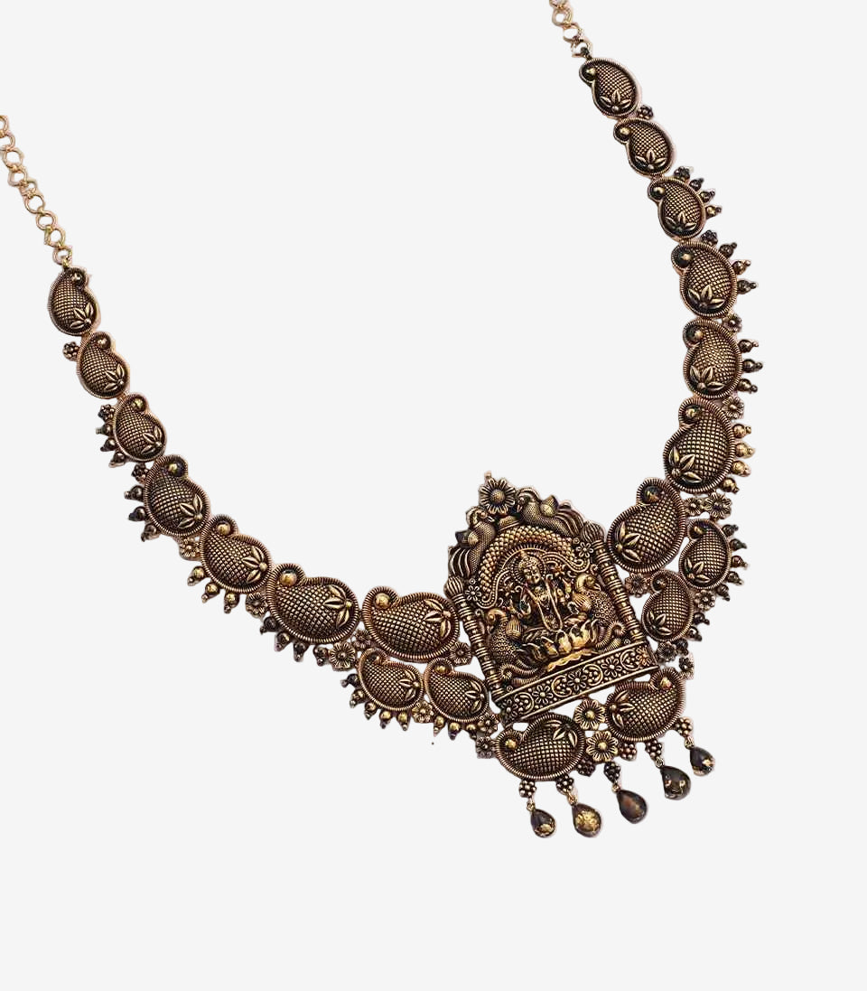 Decorative bronze necklace on a white background