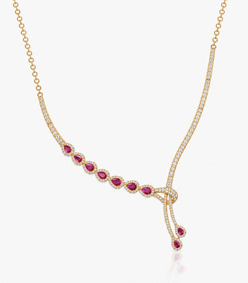 A Sophisticated Gold Necklace Featuring A Diamond-Studded Collar