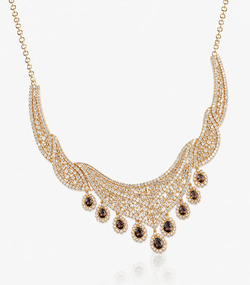 An Ornate Gold Collar Necklace Featuring Intricate Diamond-Studded