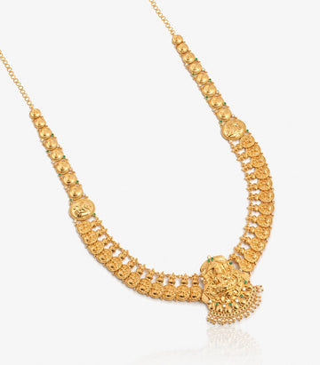A Long Yellow Gold Kasu Mala Necklace Featuring A Central Goddess Lakshmi