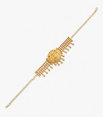 A Gold Armlet Or Bajuband Featuring A Central Circular Pendant