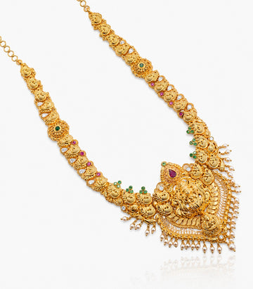 A Yellow Gold Temple Necklace Featuring A Large Heart-Shaped Pendant