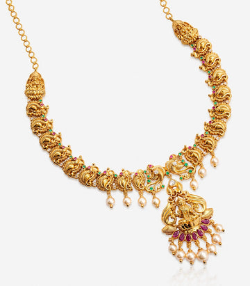 A Traditional Gold Temple Necklace Featuring A Central Goddess Lakshmi Pendant