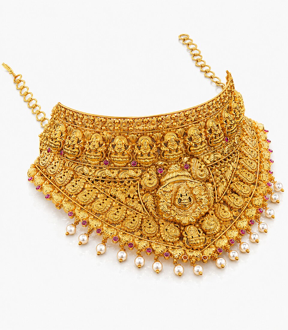 An Antique-Finish Gold Temple Haram Featuring A Large