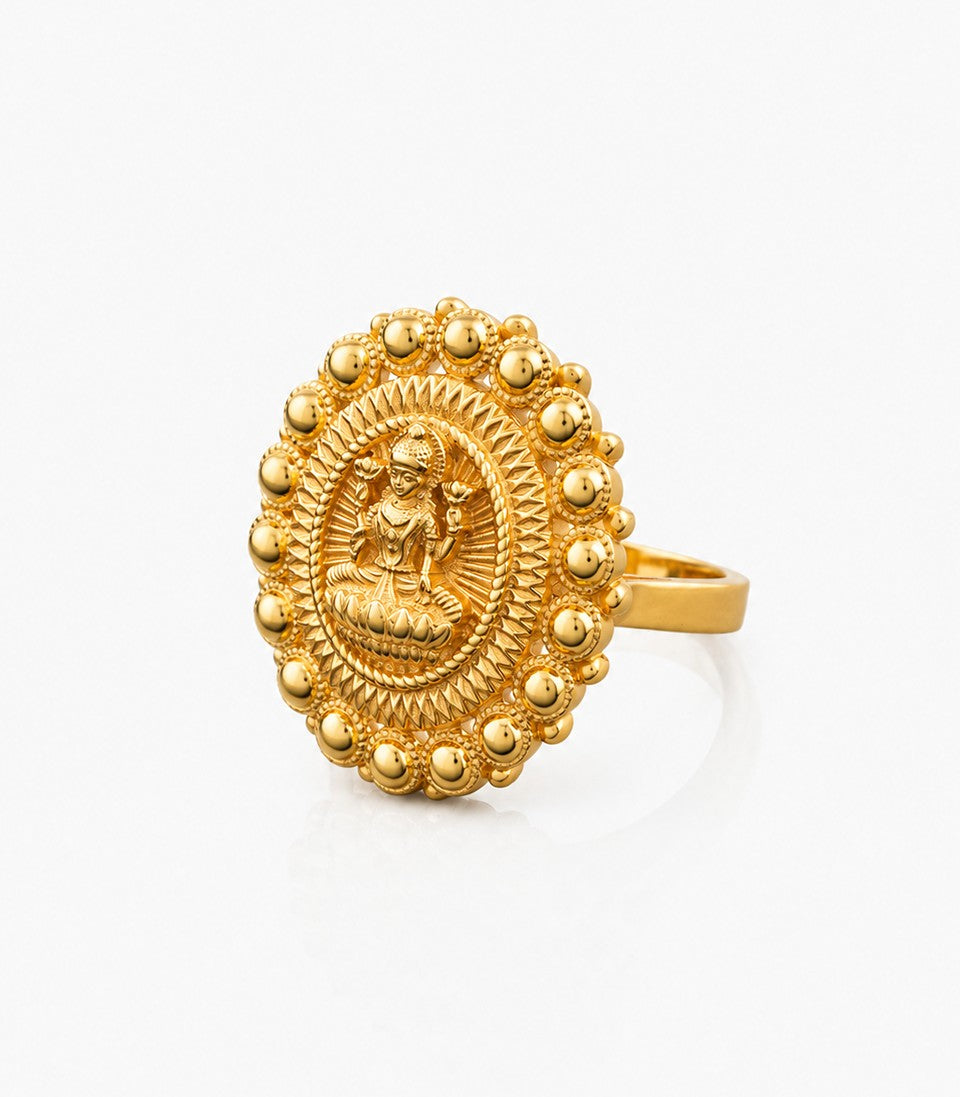 Ornate Gold Ring Showcasing Intricate Artistic Craftsmanship