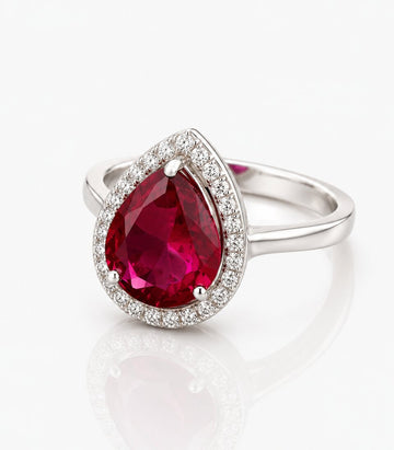 Ring With Large Red Gemstone Centerpiece
