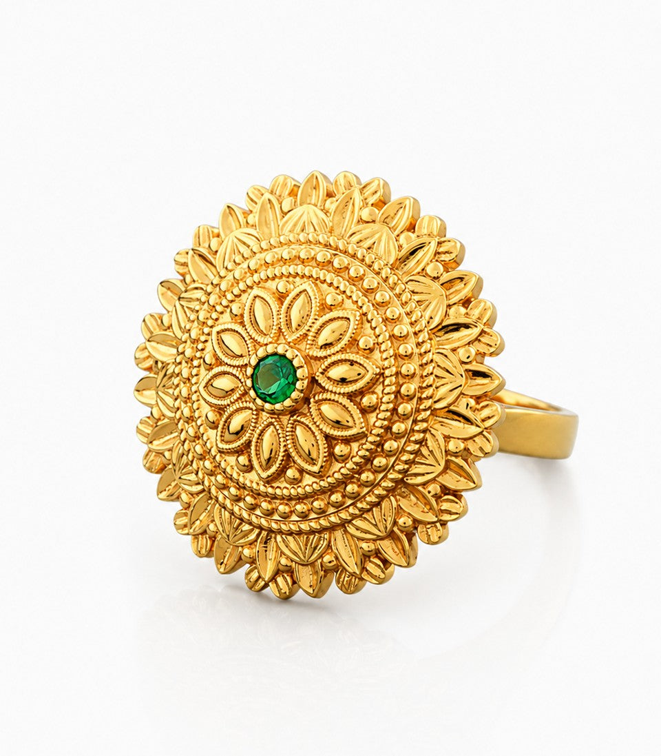 Gold Ring With Circular Design Green Center Stone
