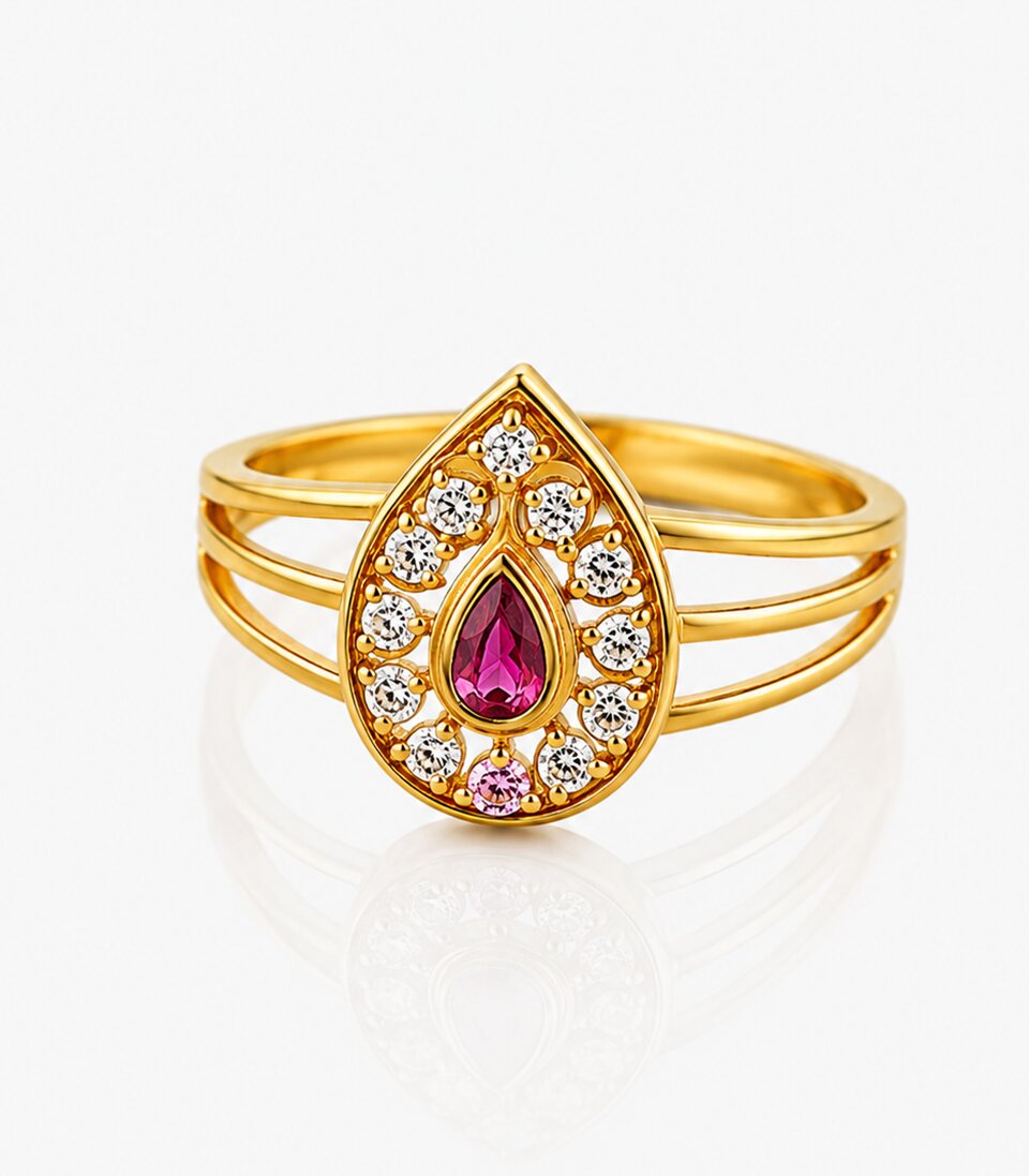 Gold ring with a teardrop-shaped pink gemstone and diamond accents on a white background