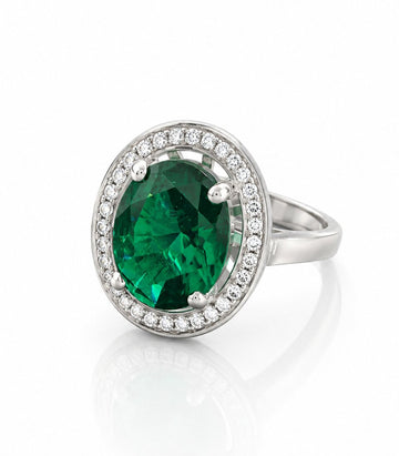 Diamond Ring With Large Green Gemstone Centerpiece